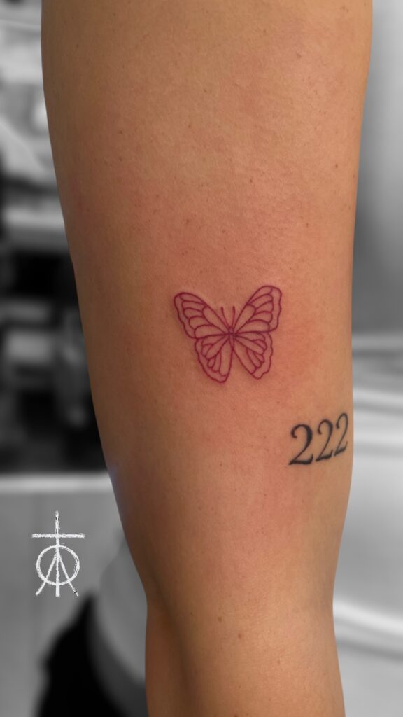 Fine Line Red Ink Butterfly Tattoo by The Best Fine Line Tattoo Artist Claudia Fedorovici